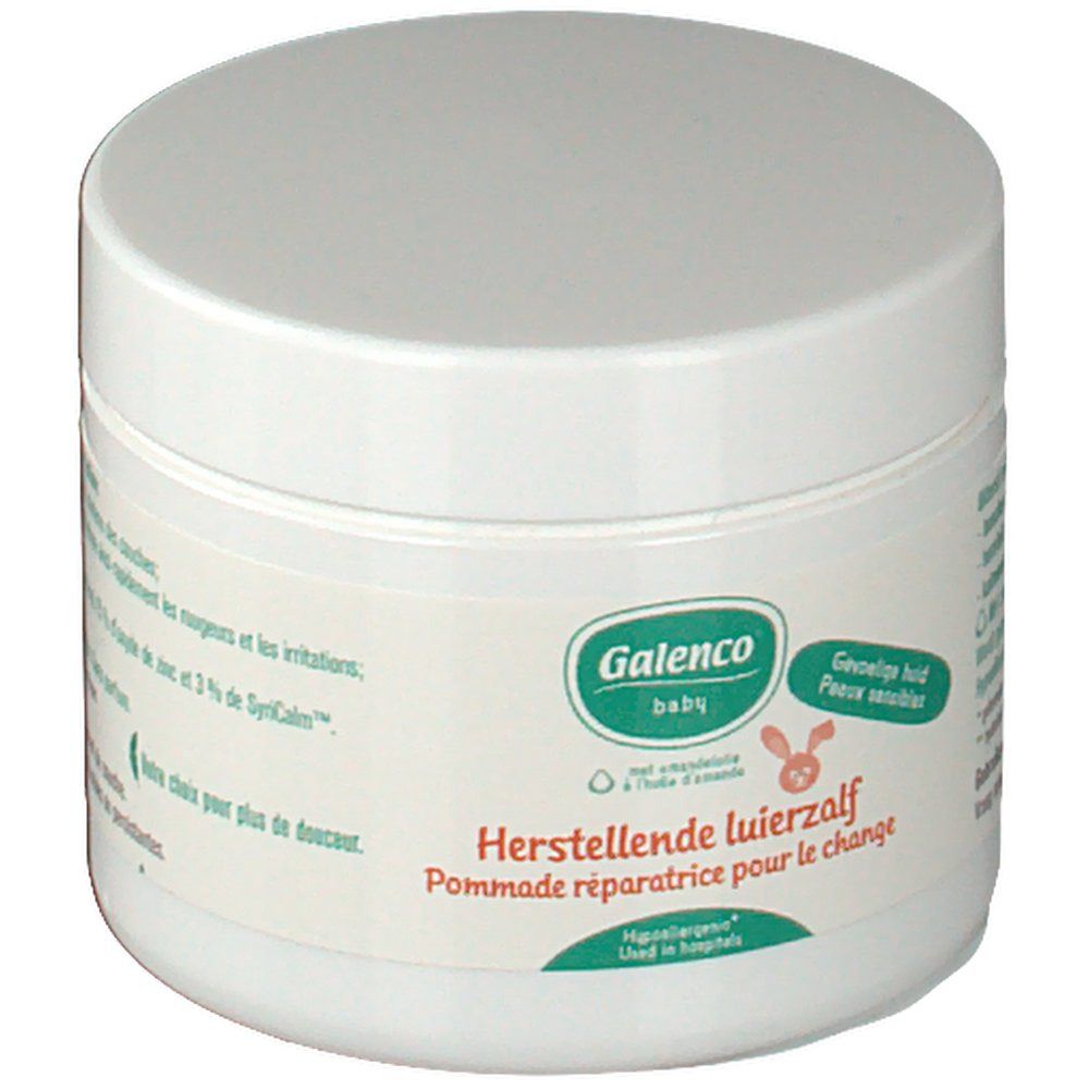 Vaso rotondo bianco con coperchio. L'etichetta riporta "Galenco baby" e "Herstellende luierzalf Pommade réparatrice pour le change".
