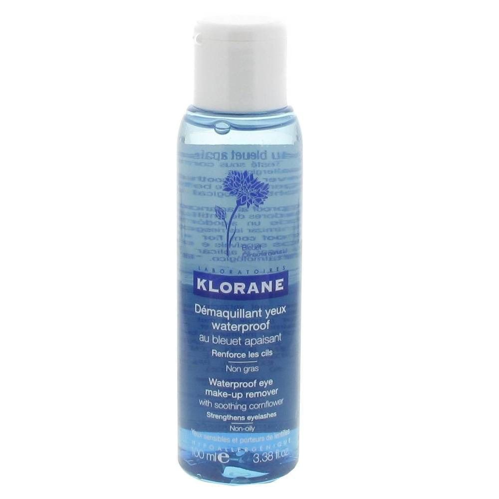 Klorane struccante occhi waterproof. Liquido blu in flacone con tappo bianco. Testo: Démaquillant yeux waterproof au bleuet apaisant.
