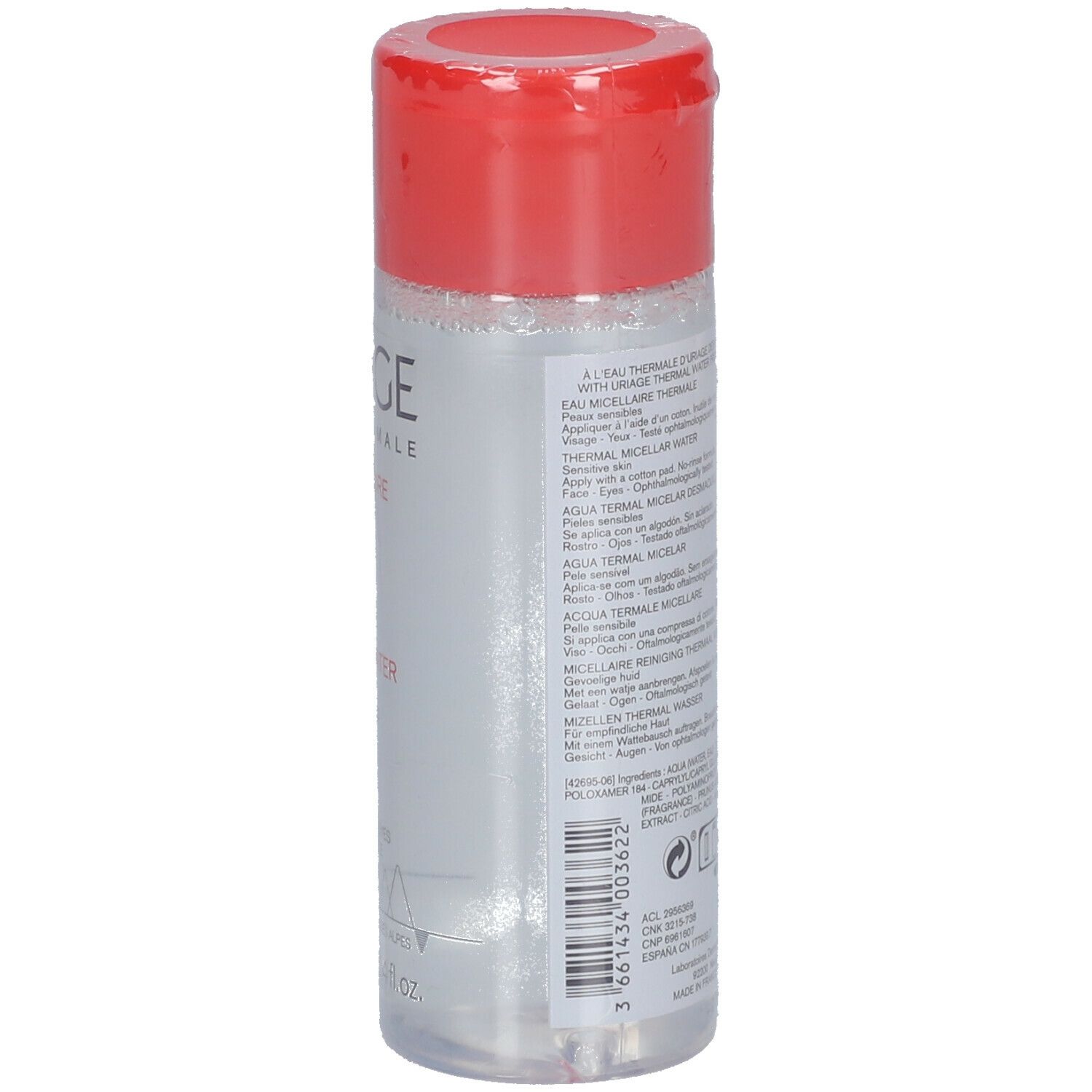 Uriage Acqua Micellare Termale. Flacone trasparente, tappo rosso. Nome del prodotto e testo sull'etichetta.