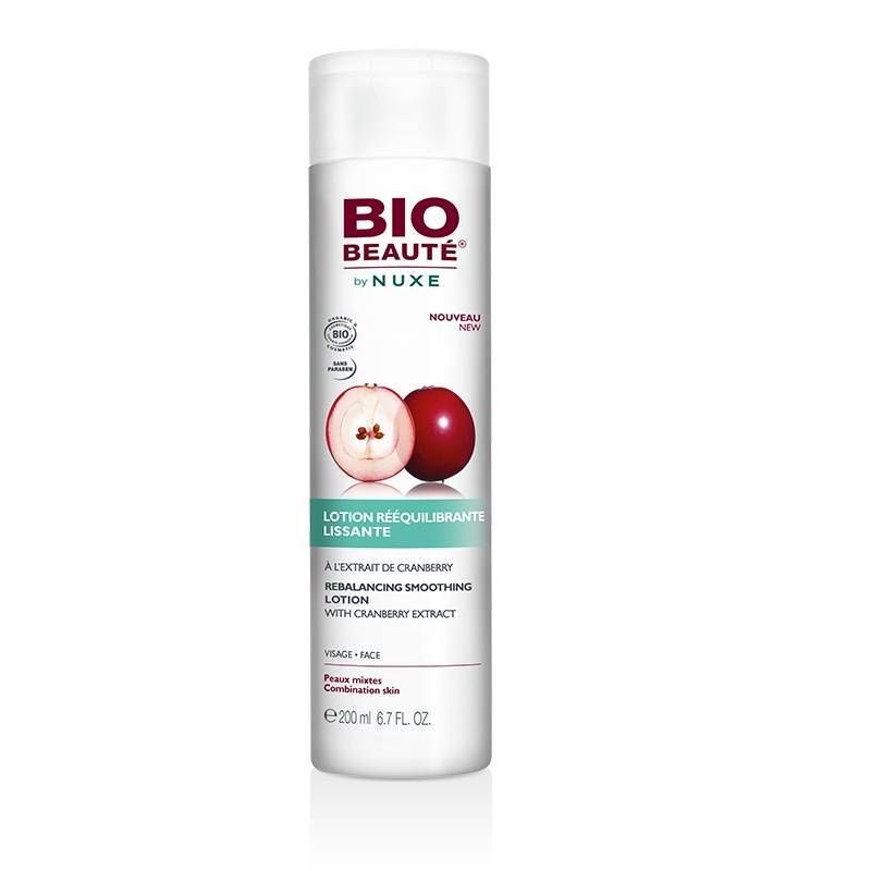 Flacone bianco con tappo bianco. Scritta: BIO BEAUTÉ by NUXE. Illustrazione di mirtillo rosso. Testo: Lotion rééquilibrante lissante.