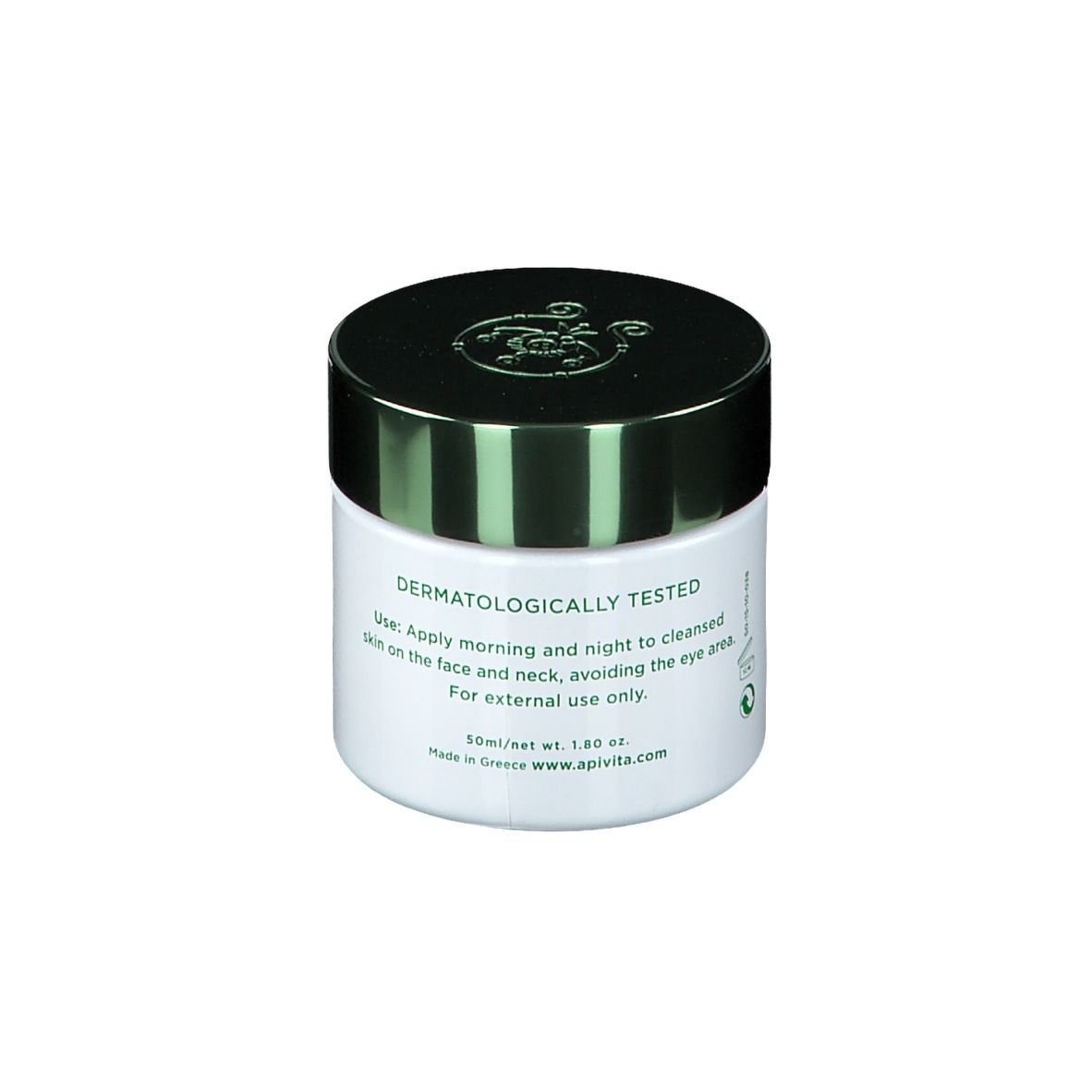 Vasetto di crema bianco con coperchio verde. Scritta: Testato dermatologicamente. Istruzioni per l'uso. 50ml/net wt. 1.8oz.