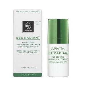 Tubo di crema occhi bianco con tappo verde accanto alla confezione. Scritta: Apivita, Bee Radiant, crema contorno occhi anti-età.