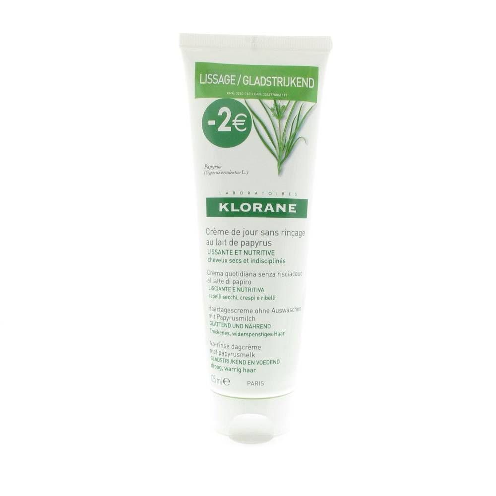 Tubo di crema Klorane. Bianco, con dettagli verdi. Testo: Lissage/Gladstrijkend, -2€, Creme de jour sans rinçage au lait de papyrus.