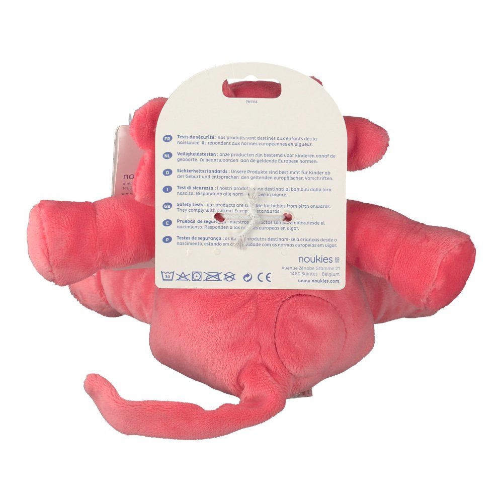 Vista posteriore del peluche rosa. Etichetta con testo. Simboli di lavaggio. L'etichetta dice 'noukies'.