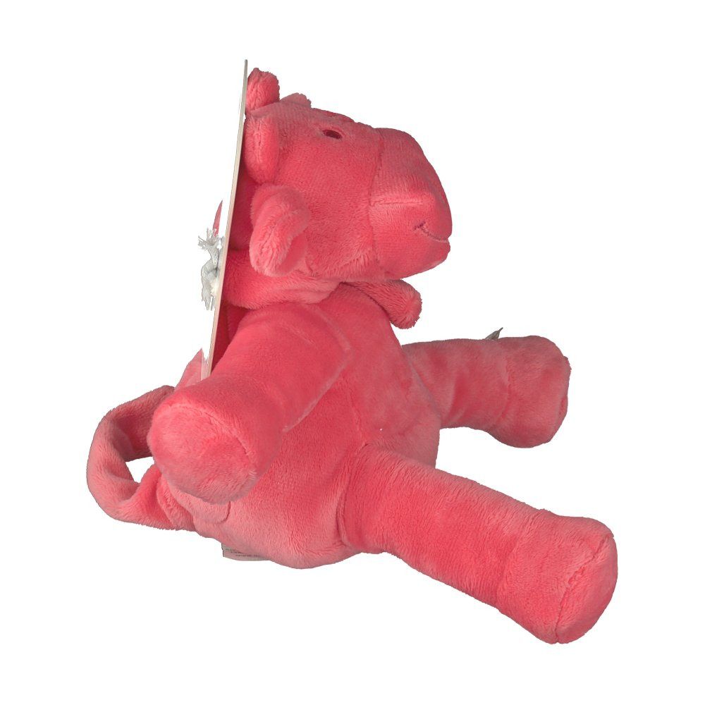 Peluche rosa a forma di mucca. Vista laterale. Etichetta. Materiale morbido. Logo cucito.