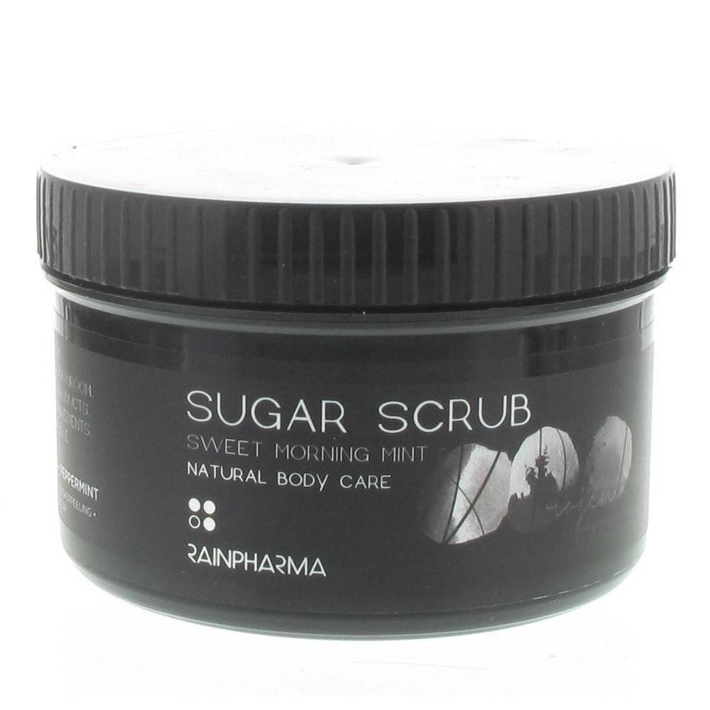 Vaso nero con coperchio bianco. Scritta: Sugar Scrub, Sweet Morning Mint, Natural Body Care. Marchio: RAINPHARMA.