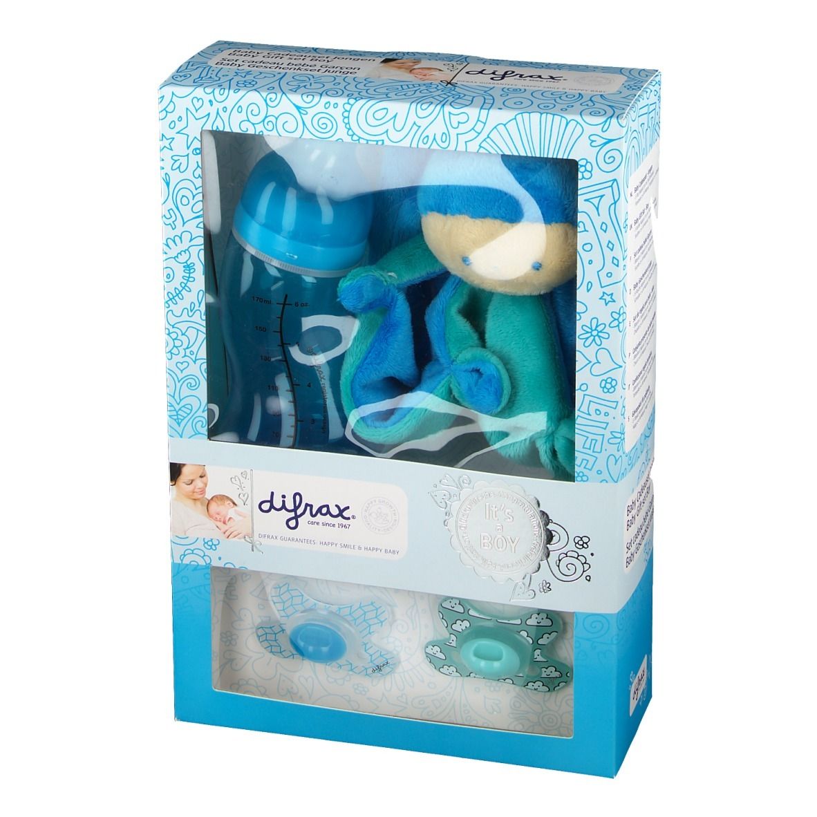Confezione regalo con biberon, ciucci e peluche. Marchio: Difrax. Contenuto visibile. Scritta "It's a Boy".