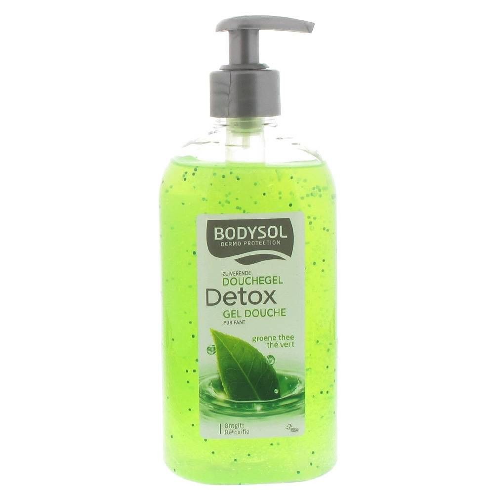 Flacone di gel doccia verde con pompa. Scritta Bodysol Detox. Contiene particelle verdi e un simbolo di foglia. Nome e marchio visibili.
