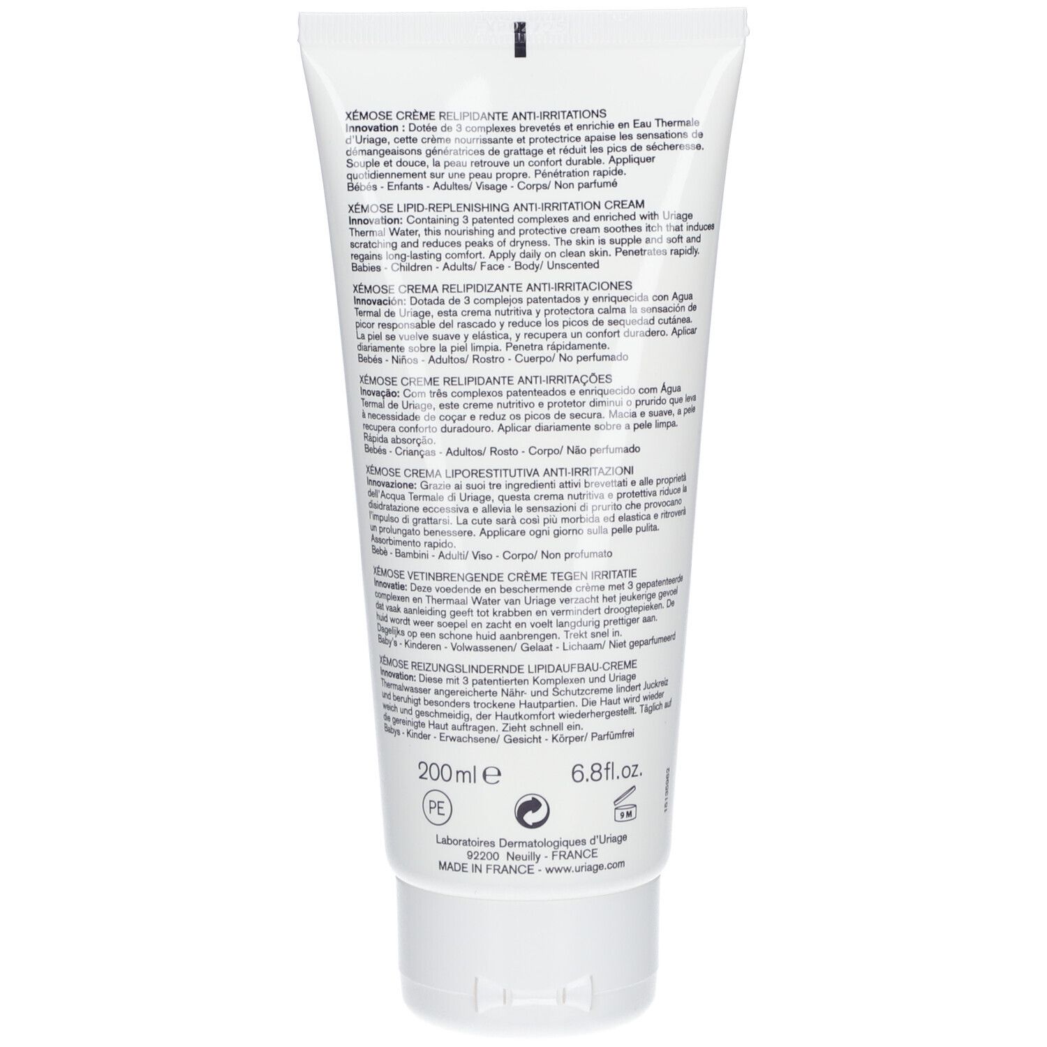 Retro del tubo bianco. Testo multilingue. Uriage Xémose Crema. Ingredienti, istruzioni per l'uso.