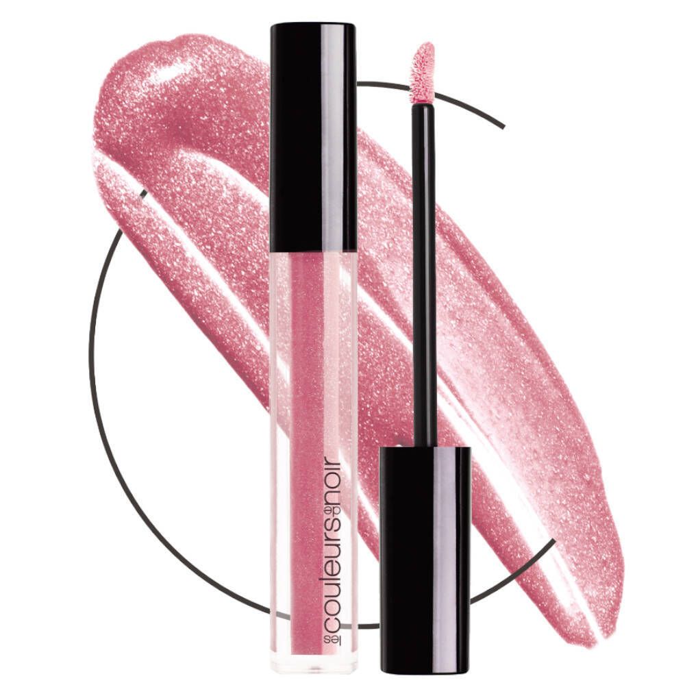 Lucidalabbra con applicatore. Tubo trasparente con contenuto rosa. Tappo nero. Tratto di colore rosa sullo sfondo.
