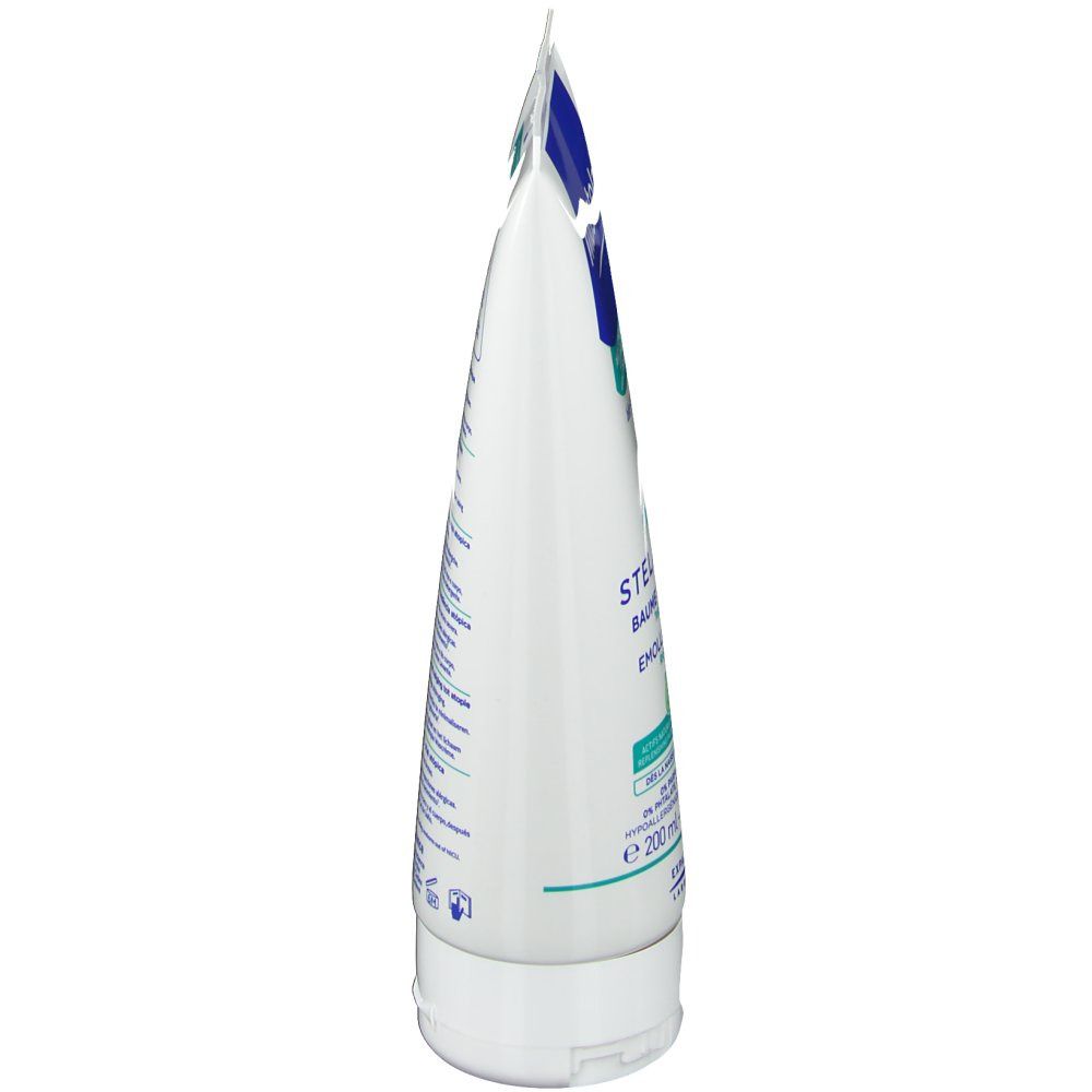 Vista laterale di un tubo bianco. Scritte parzialmente visibili. Tappo e chiusura bianchi. Testo in più lingue.