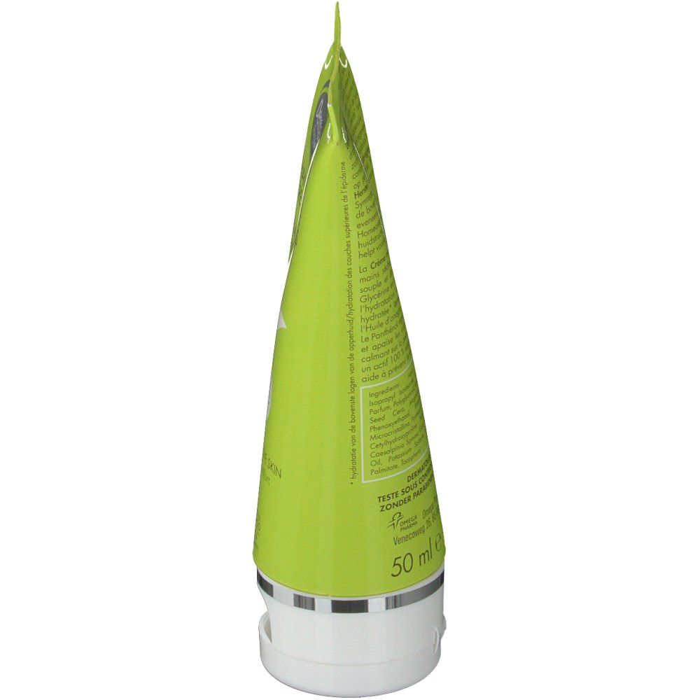 Vista laterale del tubo di crema mani verde. Testo sul retro e indicazione di 50 ml.