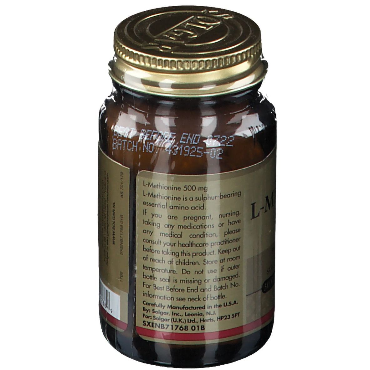 Retro di un flacone di vetro marrone con coperchio dorato. Etichetta con informazioni sul prodotto. Marca: Solgar.