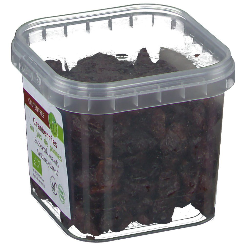 Contenitore trasparente con mirtilli rossi. Etichetta con testo: Cranberries au jus de pommes, Superaliments, Antioxidant. Senza glutine.