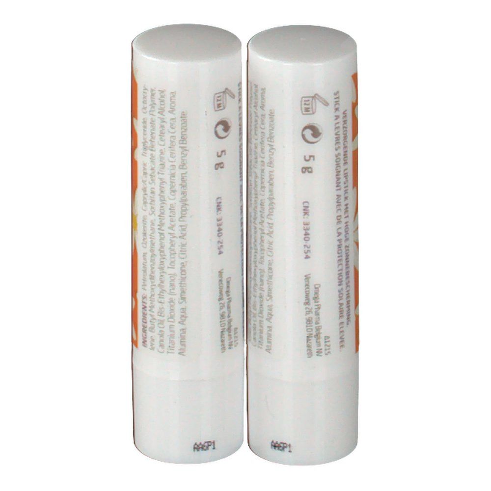 Due rossetti con tappo bianco. Retro con ingredienti e testo. Motivo margherita su sfondo arancione.