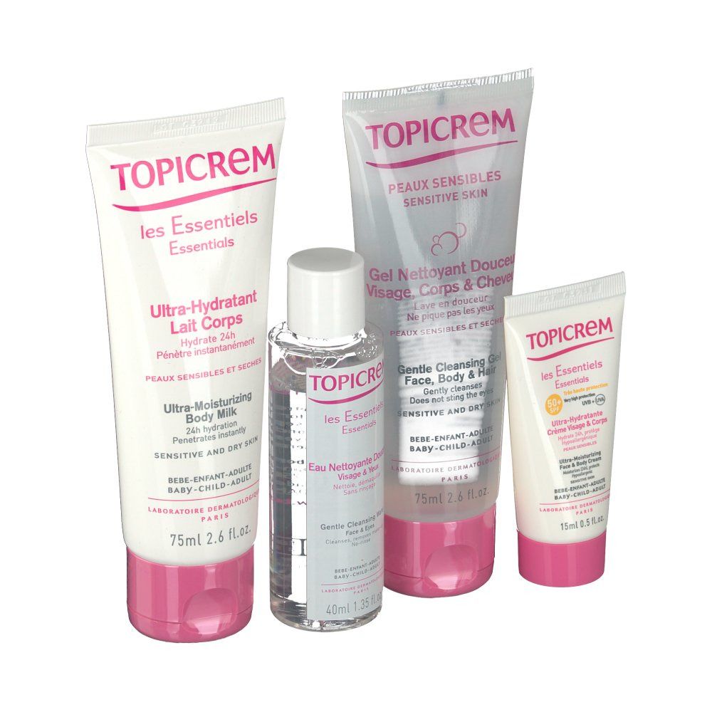 Quattro prodotti cosmetici Topicrem: latte corpo, gel detergente, crema viso e acqua detergente. Tubi bianchi con dettagli rosa.
