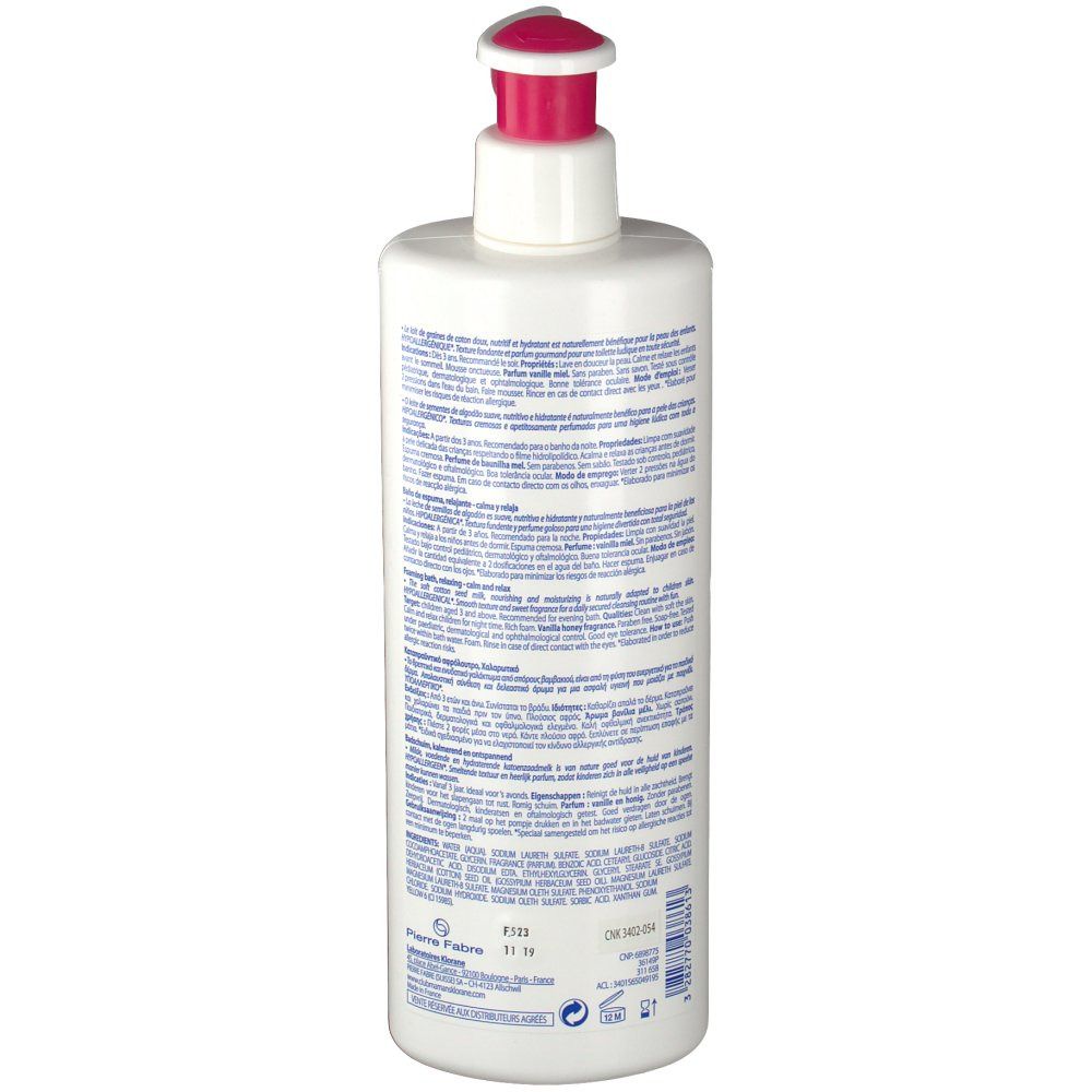 Retro di un flacone bianco con erogatore rosa. Testo in più lingue. Scritta: Klorane. Informazioni sul prodotto.