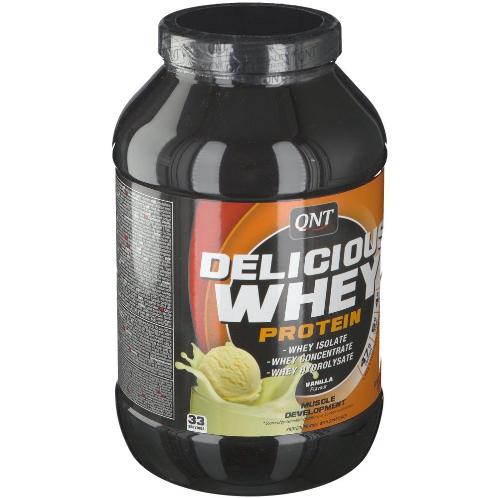 Barattolo nero QNT Delicious Whey Protein. Scritta: Vaniglia, isolato, concentrato, idrolizzato. Illustrazione: dessert vaniglia. Coperchio nero.