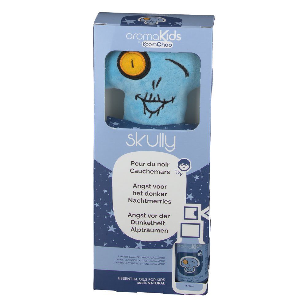 Confezione del prodotto con peluche blu a forma di teschio. Teschio stampato con occhio giallo. Nome del prodotto e testi multilingue.