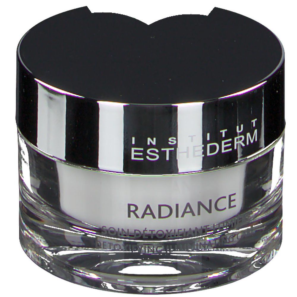 Vasetto di vetro con coperchio nero. Scritta: INSTITUT ESTHEDERM, RADIANCE, SOIN DÉTOXIFIANT LUMIÈRE, DETOXIFYING ILLUMINATING CARE.