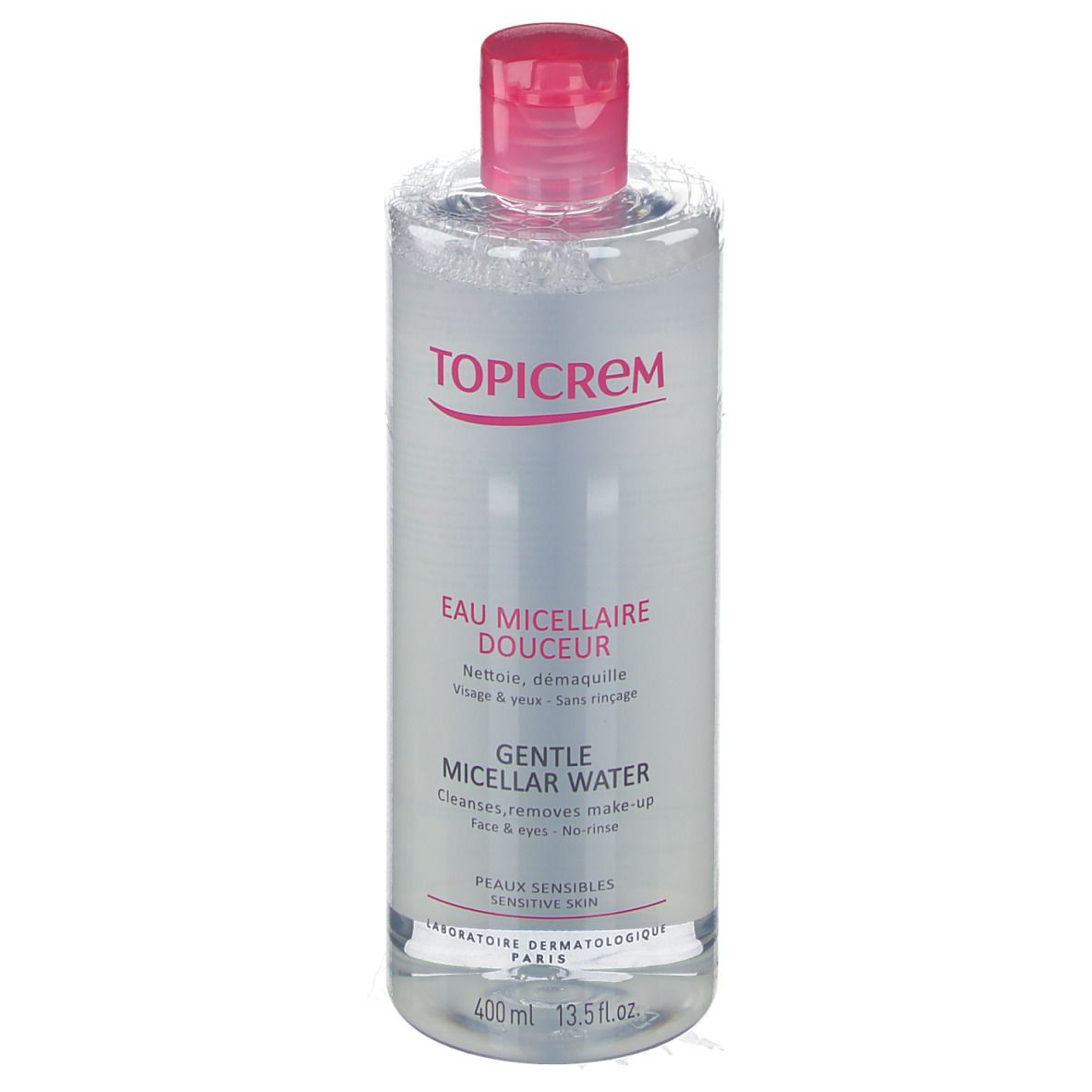 Flacone trasparente, tappo rosa. Scritta TOPICREM, Eau Micellaire Douceur, Gentle Micellar Water. Per pelli sensibili.