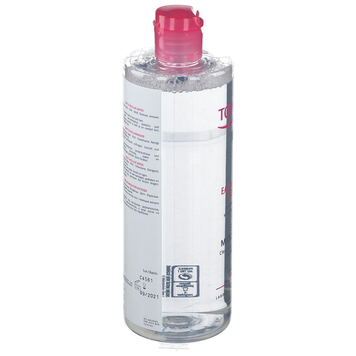 Flacone trasparente, tappo rosa. Etichetta con testo multilingue. Prodotto per pelli sensibili.