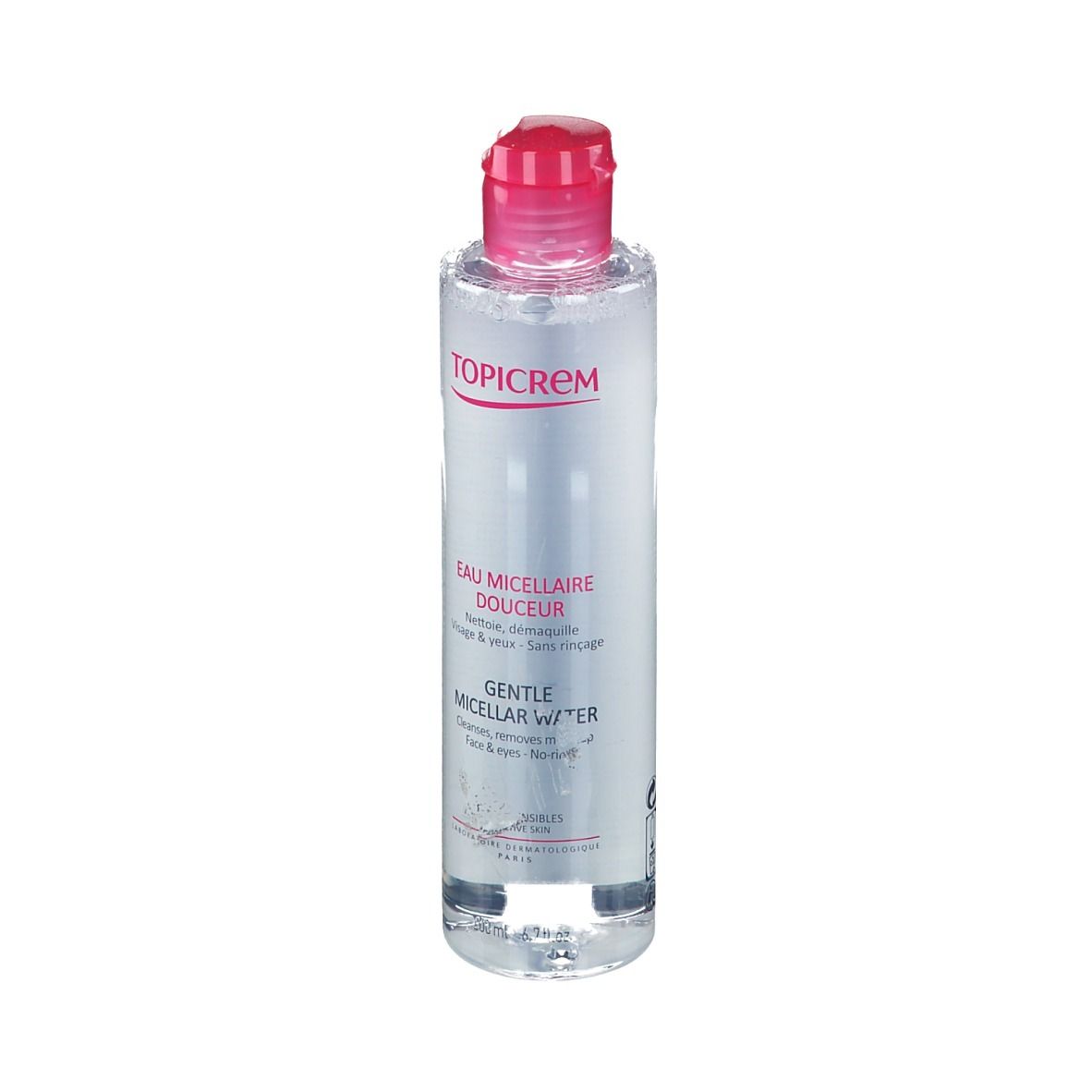 Liquido trasparente in flacone cilindrico con tappo rosa. Scritte: TOPICREM, Eau Micellaire Douceur, Gentle Micellar Water.