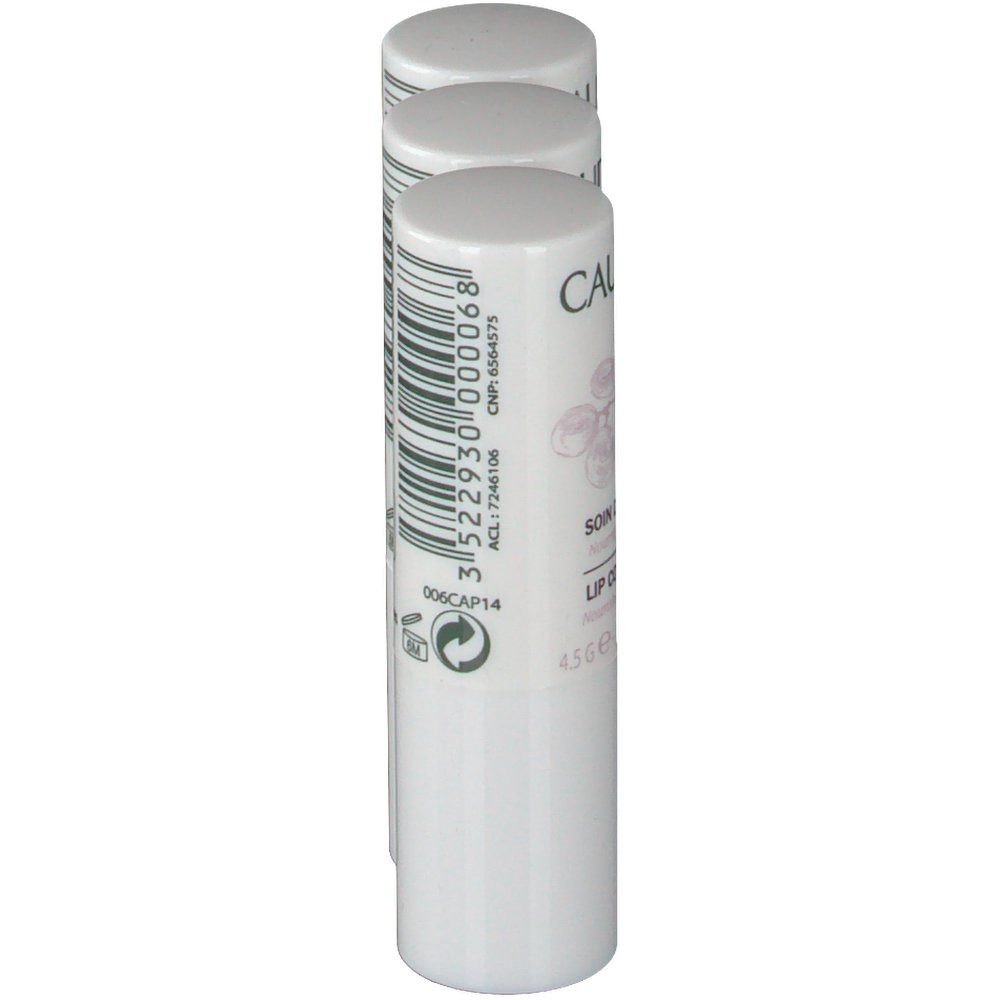 Tre stick labbra bianchi. Scritta: Caudalie, Soin des Lèvres, Lip Conditioner. Codice a barre e numero di lotto.