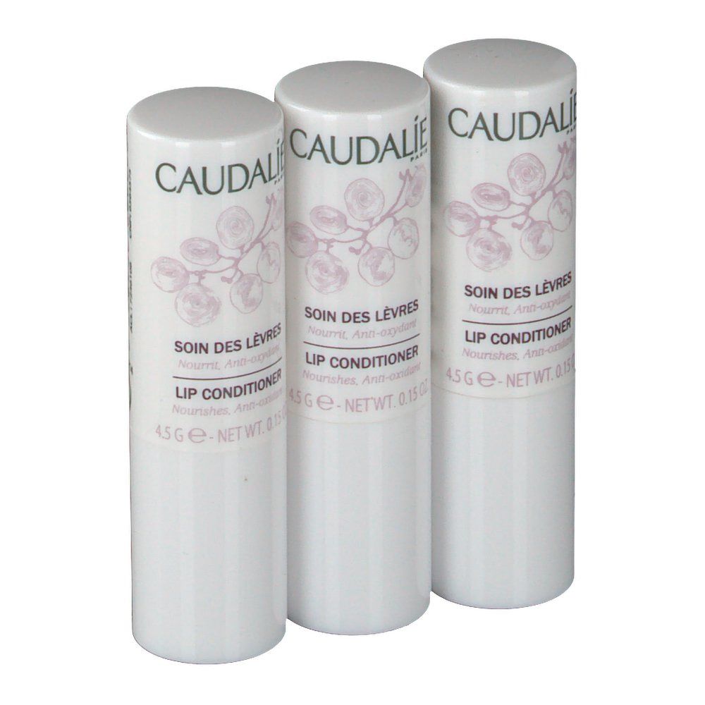 Tre stick labbra bianchi. Scritta: Caudalie, Soin des Lèvres, Lip Conditioner. Vista del prodotto.