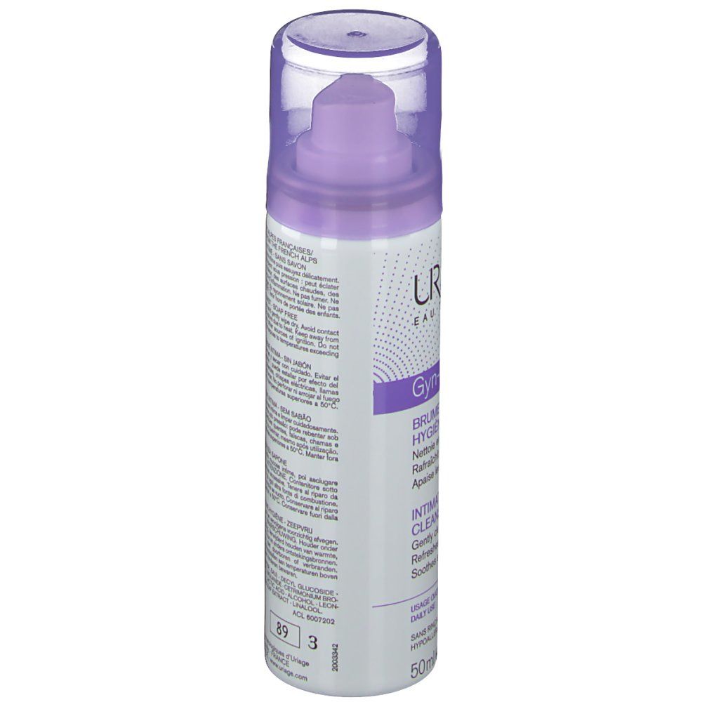 Flacone cilindrico con vaporizzatore. Scritte viola e bianche. Testo: Uriage, Gyn-Phy, Brume Nettoyante. Tappo trasparente.