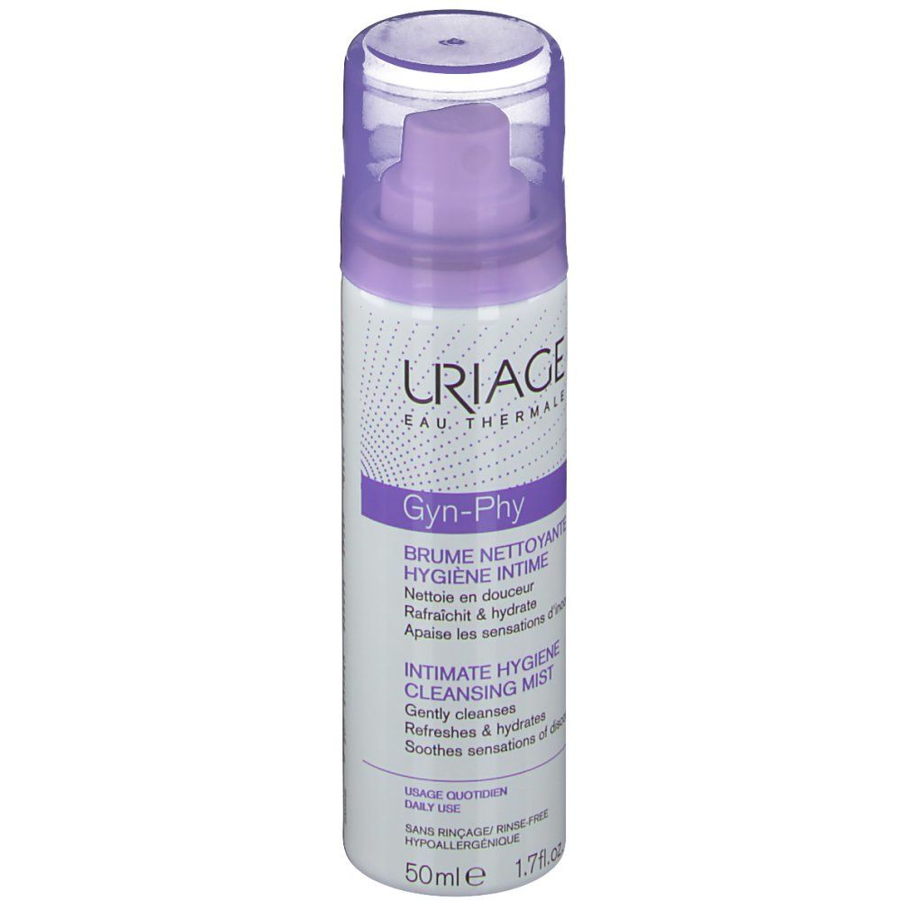 Flacone cilindrico con vaporizzatore. Scritte viola e bianche. Testo: Uriage, Gyn-Phy, Brume Nettoyante. Tappo trasparente.