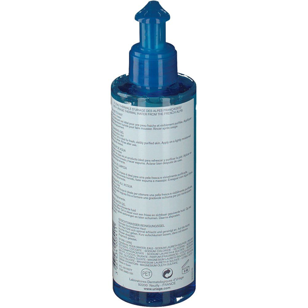 Retro del flacone blu con dosatore a pompa. Testo multilingue. Scritta: Laboratoire Dermatologique Uriage.