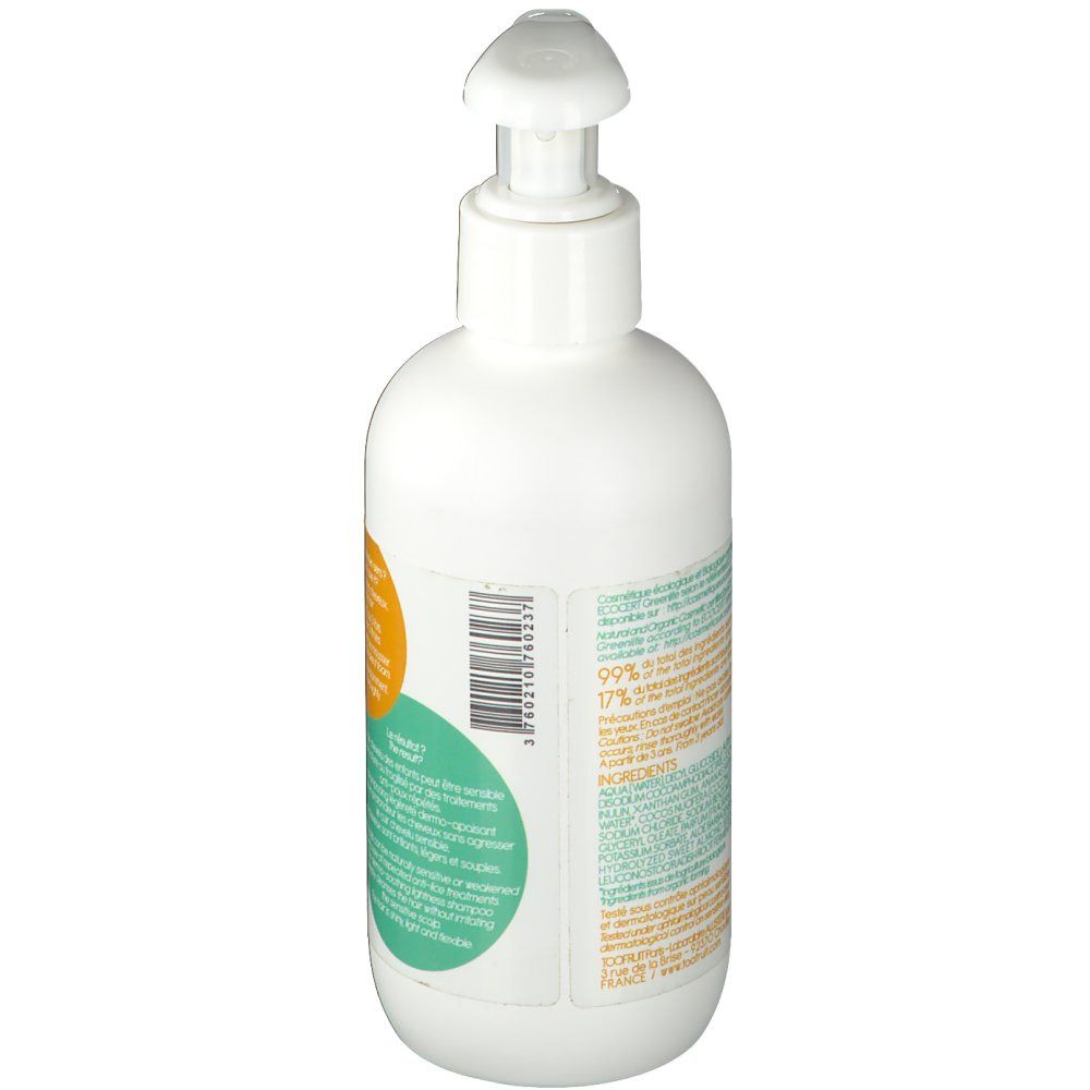 Flacone bianco con dosatore. Etichetta con testo e codice a barre. Vista posteriore.