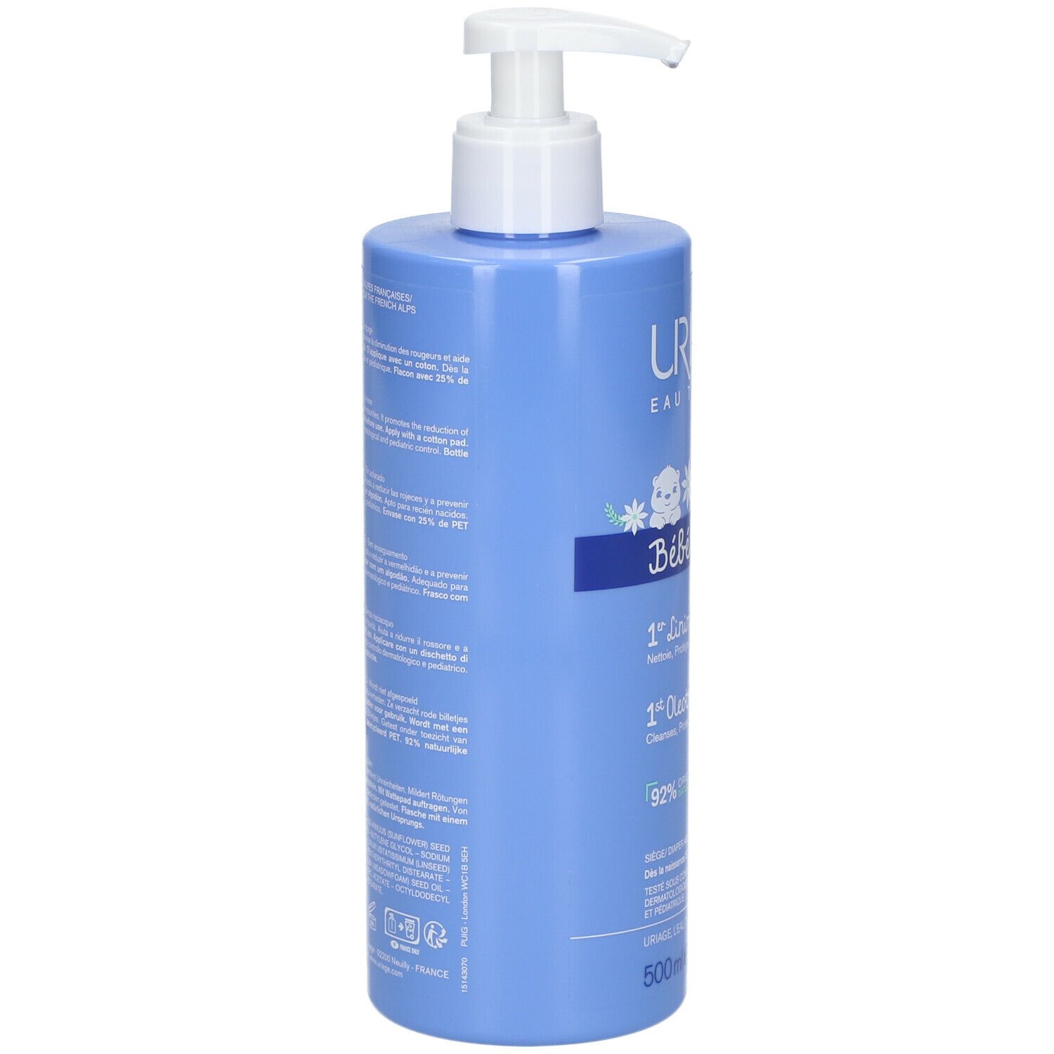 Flacone blu chiaro con dosatore bianco. Retro con testo. Scritta: Uriage, Bébé, 1er Liniment oléothermal, 500ml.