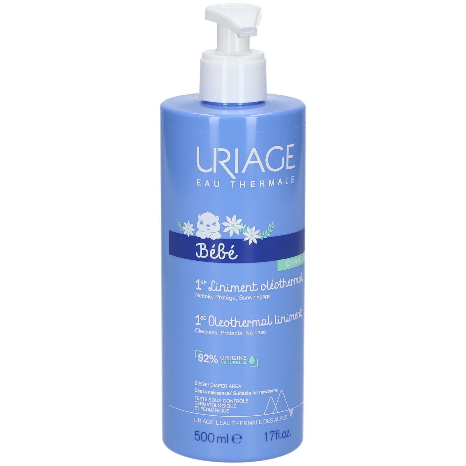 Flacone blu chiaro con dosatore bianco. Scritta: Uriage, Bébé, 1er Liniment oléothermal, 500ml.