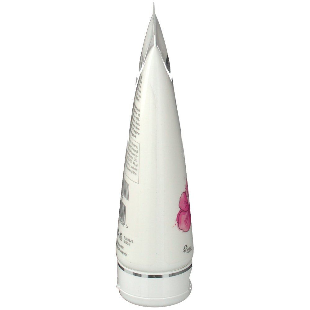 Vista laterale di un tubo bianco. Contiene testo e un'illustrazione di orchidea.