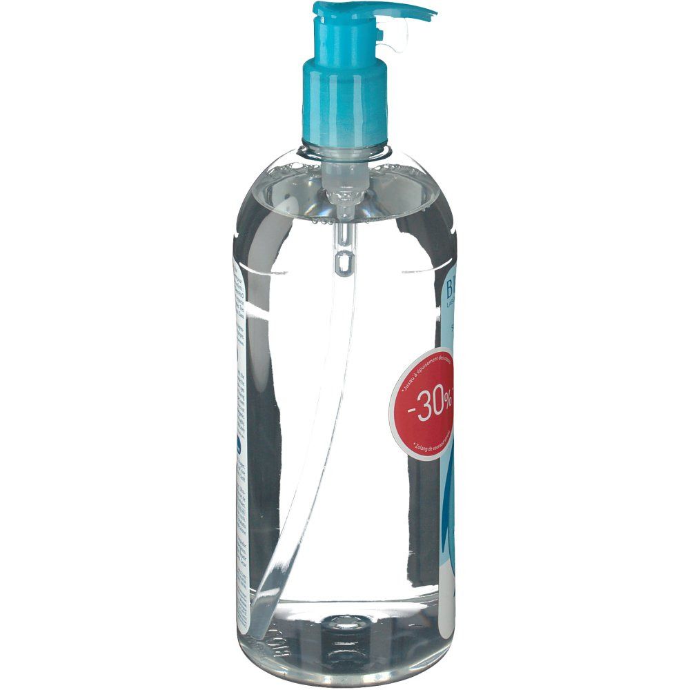 Flacone trasparente con tappo a pompa blu. Etichetta con testo e indicazione sconto -30%. Liquido visibile.