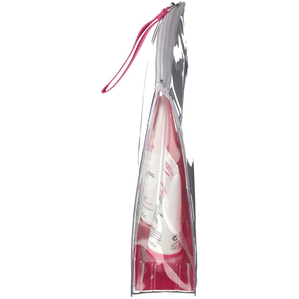 Vista laterale della pochette da viaggio trasparente Topicrem. Passante rosa. Prodotti visibili all'interno.