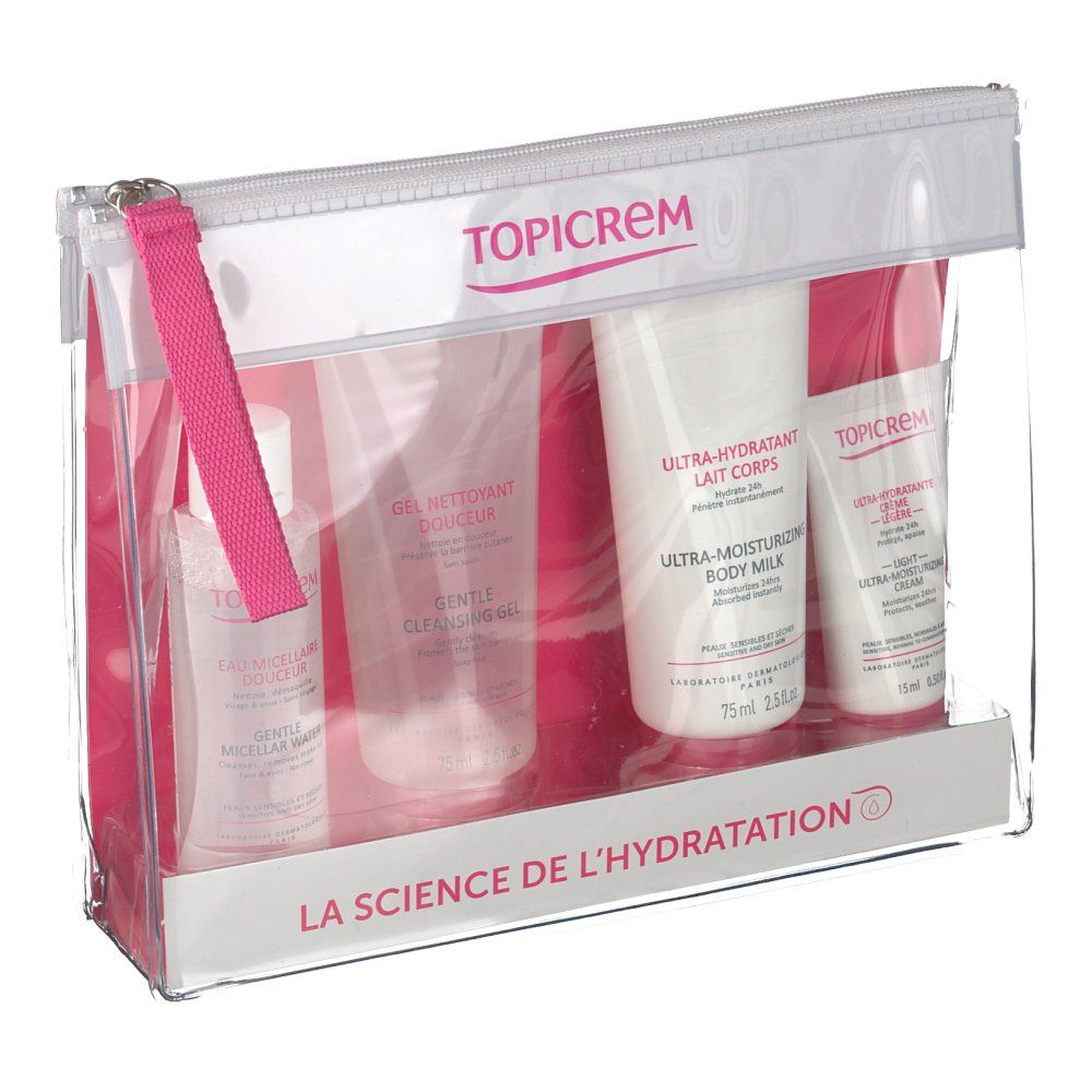 Pochette da viaggio trasparente con quattro prodotti Topicrem. Contiene gel detergente, latte corpo, crema e acqua micellare. Dettagli rosa.