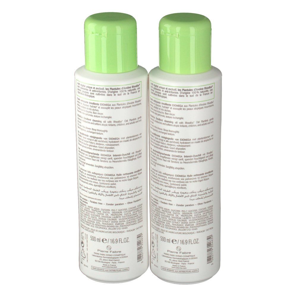 Due flaconi A-Derma EXOMEGA Duo Aceite Limpiador Emoliente. Vista posteriore. Flaconi bianchi con tappi verdi. Testo sul retro.