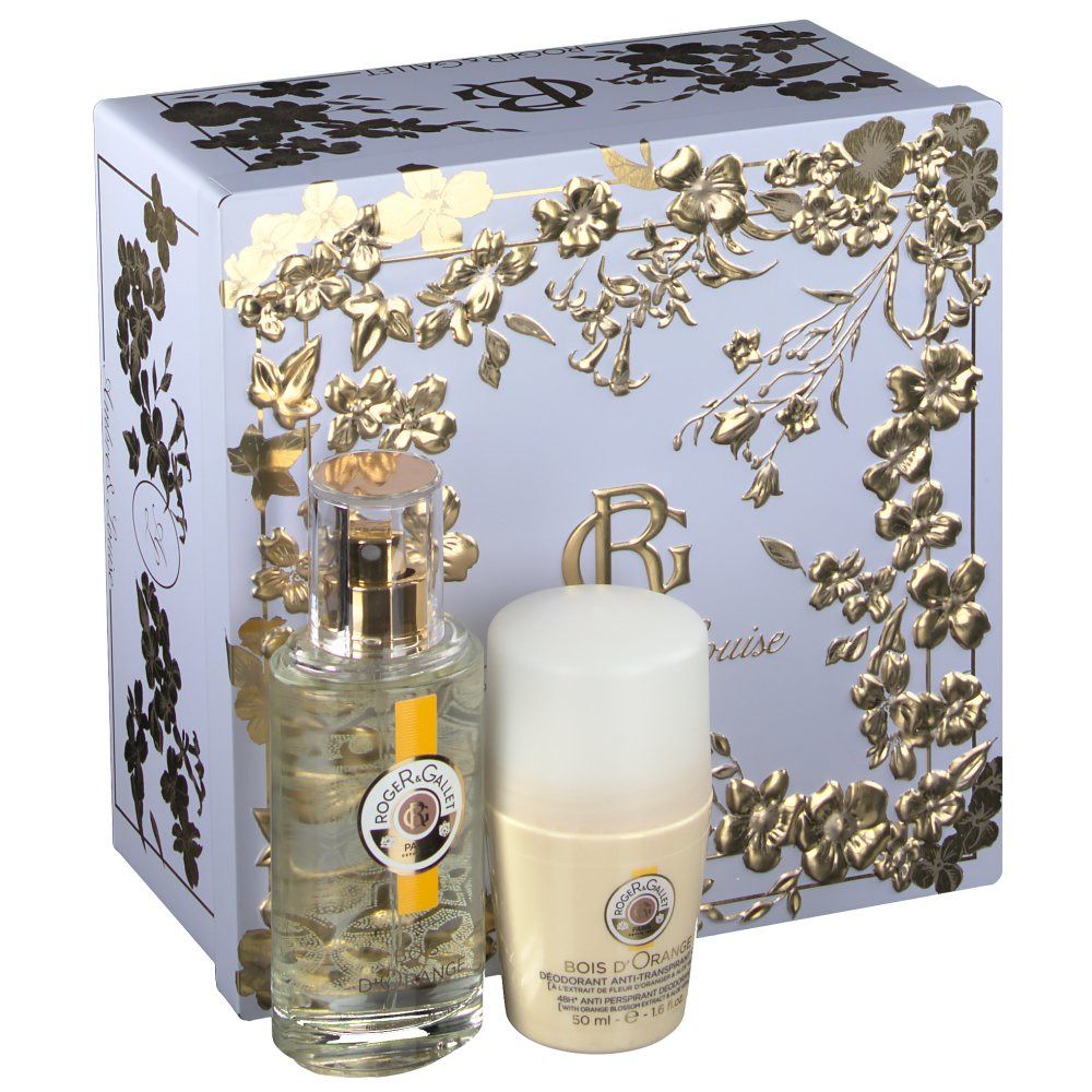 Set regalo con flacone, deodorante e scatola. Flacone e deodorante sono davanti a una scatola azzurra con motivi floreali dorati.