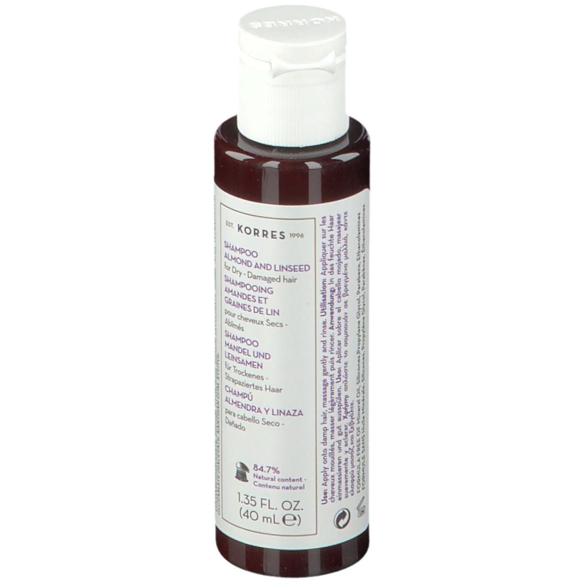 Flacone shampoo KORRES. Retro con testo, tappo bianco. Testo: Mandorla e lino per capelli secchi, 84,7% ingredienti naturali.