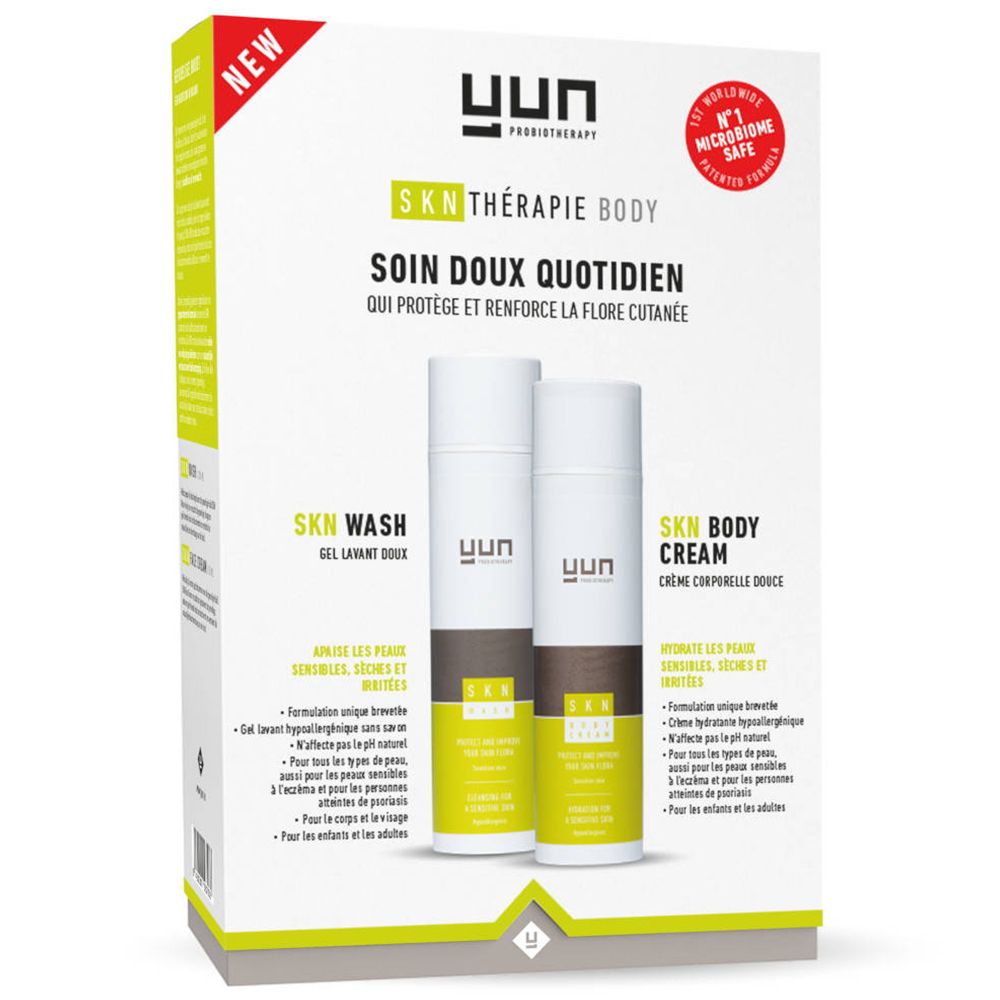 Confezione con SKN Wash e SKN Body Cream. Flaconi bianchi, dettagli marroni e verdi. Scritta YUN. Testo in francese.