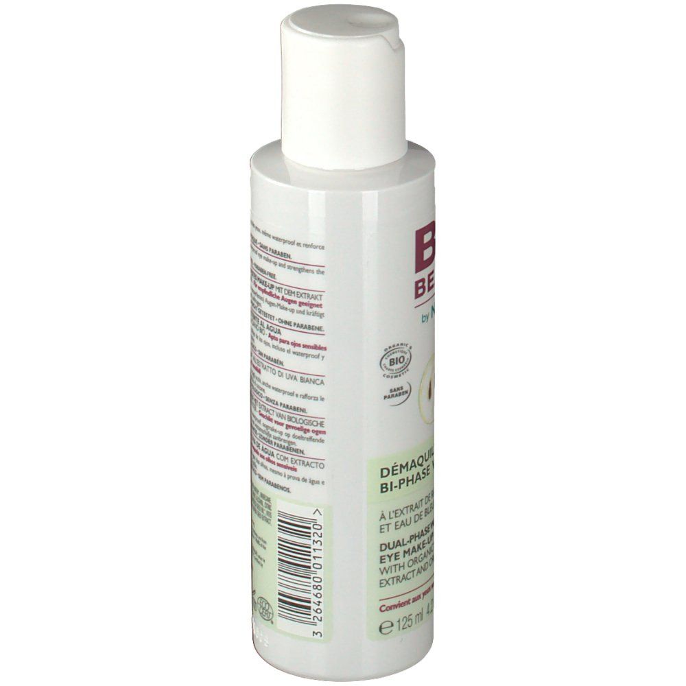 Flacone bianco con tappo bianco. Scritte e testo sul retro. Informazioni sul prodotto.