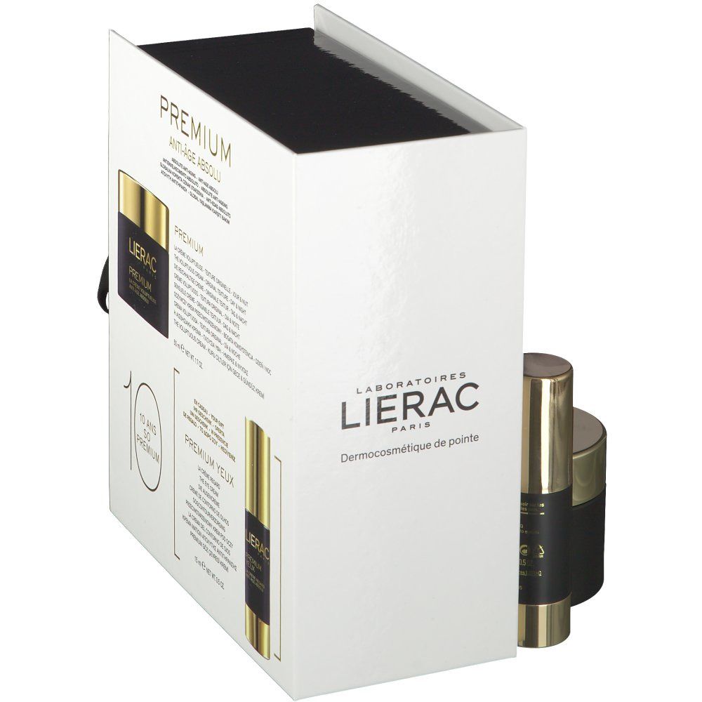 Confezione regalo con crema e contorno occhi. Vasi e flacone neri e dorati. Logo e testo sulla scatola.