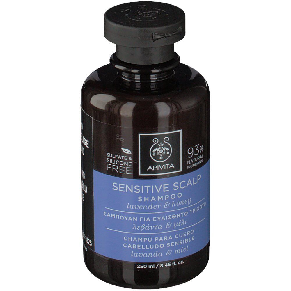 Flacone marrone, testo blu. Testo: SENSITIVE SCALP SHAMPOO, lavanda e miele. Senza solfati e siliconi. 250 ml.