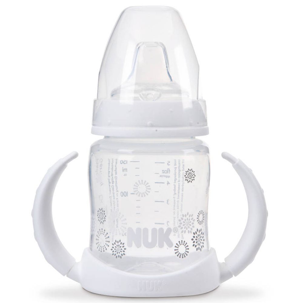 Biberon NUK First Choice bianco con manici e scala graduata. Tettarella e coperchio in plastica trasparente.