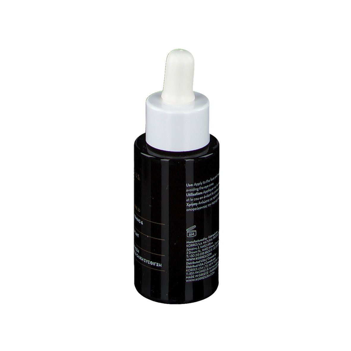 Flacone nero con tappo bianco e pipetta. Retro con testo. KORRES Black Pine 3D Siero.