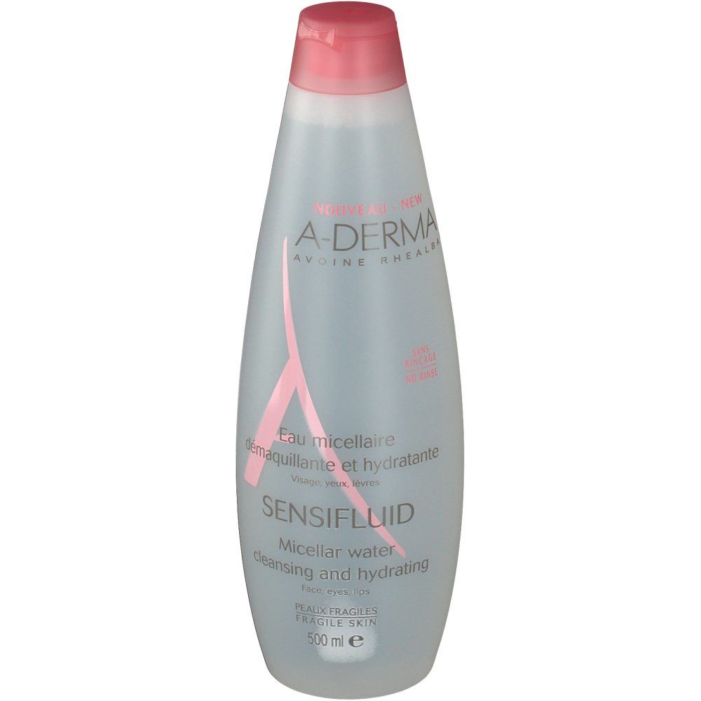 Flacone trasparente con tappo rosa. Logo A-DERMA e nome del prodotto SENSIFLUID. Testo sul flacone. 500 ml.