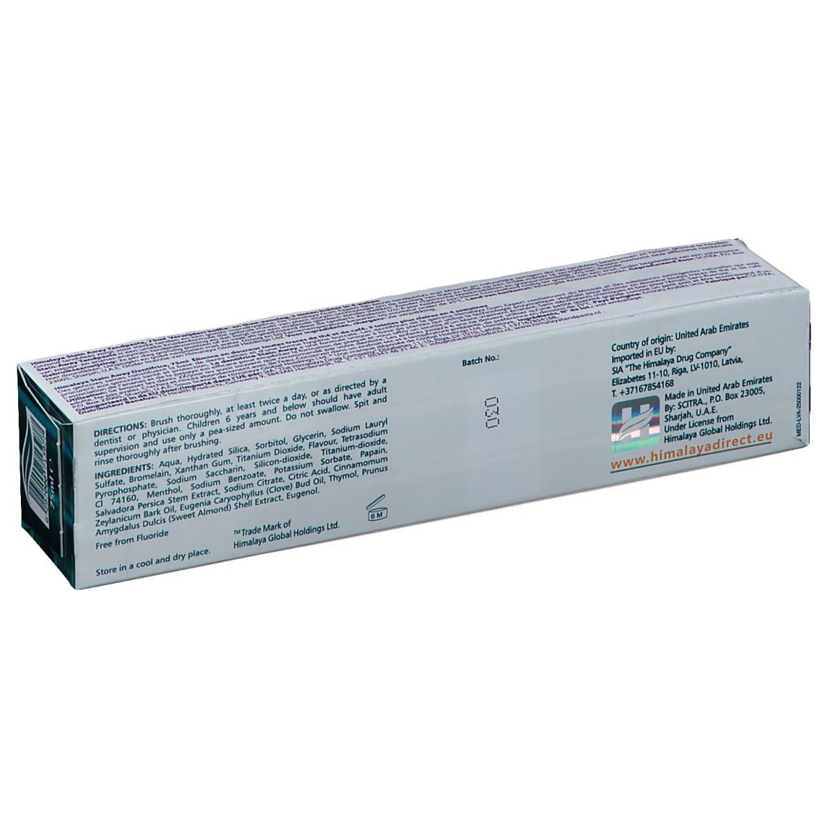 Retro della confezione del dentifricio "Himalaya Stain-Away". Contiene ingredienti, istruzioni per l'uso e informazioni del produttore.